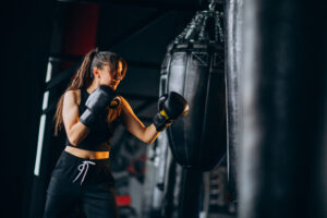 young-woman-boxer-training-gym